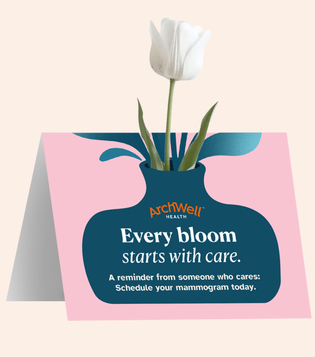 Pink Letter Project postcard reading “Every bloom starts with care. A reminder from someone who cares: schedule your mammogram today.”